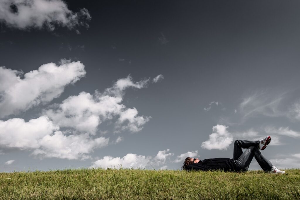 man grass lying resting relaxing 1867800